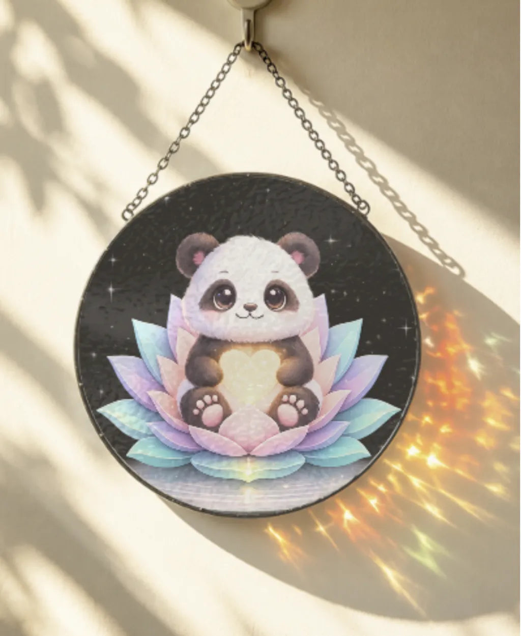 Decorative wall hanging with a panda and lotus design on a black background